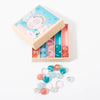 Mini box of Miami Wave marbles in peach pink turquoise clear from Biulles & Co